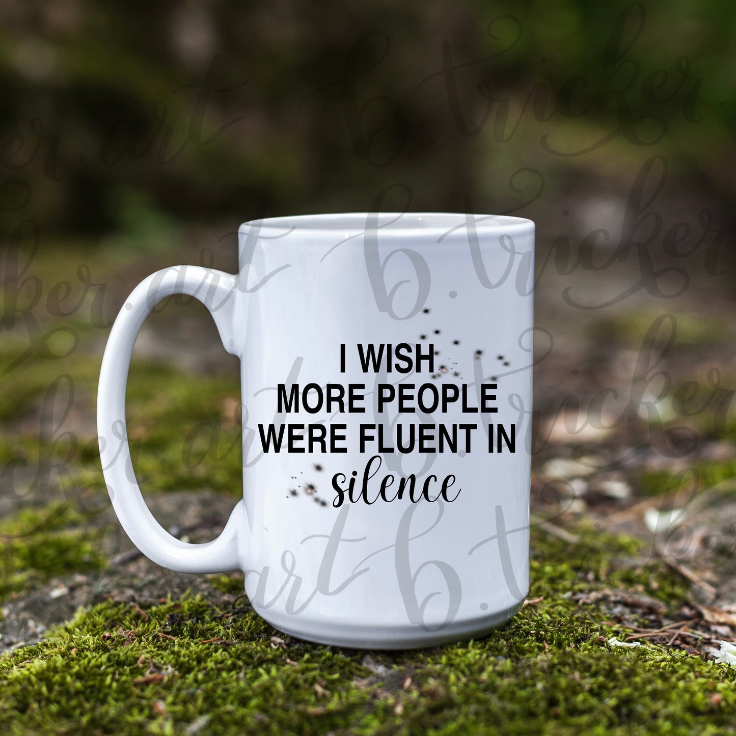 White mug with text 'I wish more people were fluent in silence' on a natural background rude funny custom on a 110z mug